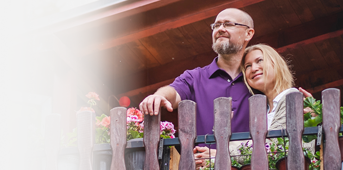 Staying on Track hero header image: elderly couple hugging