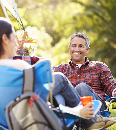 IgG4-RD Management hero header image: couple sitting outside in chairs